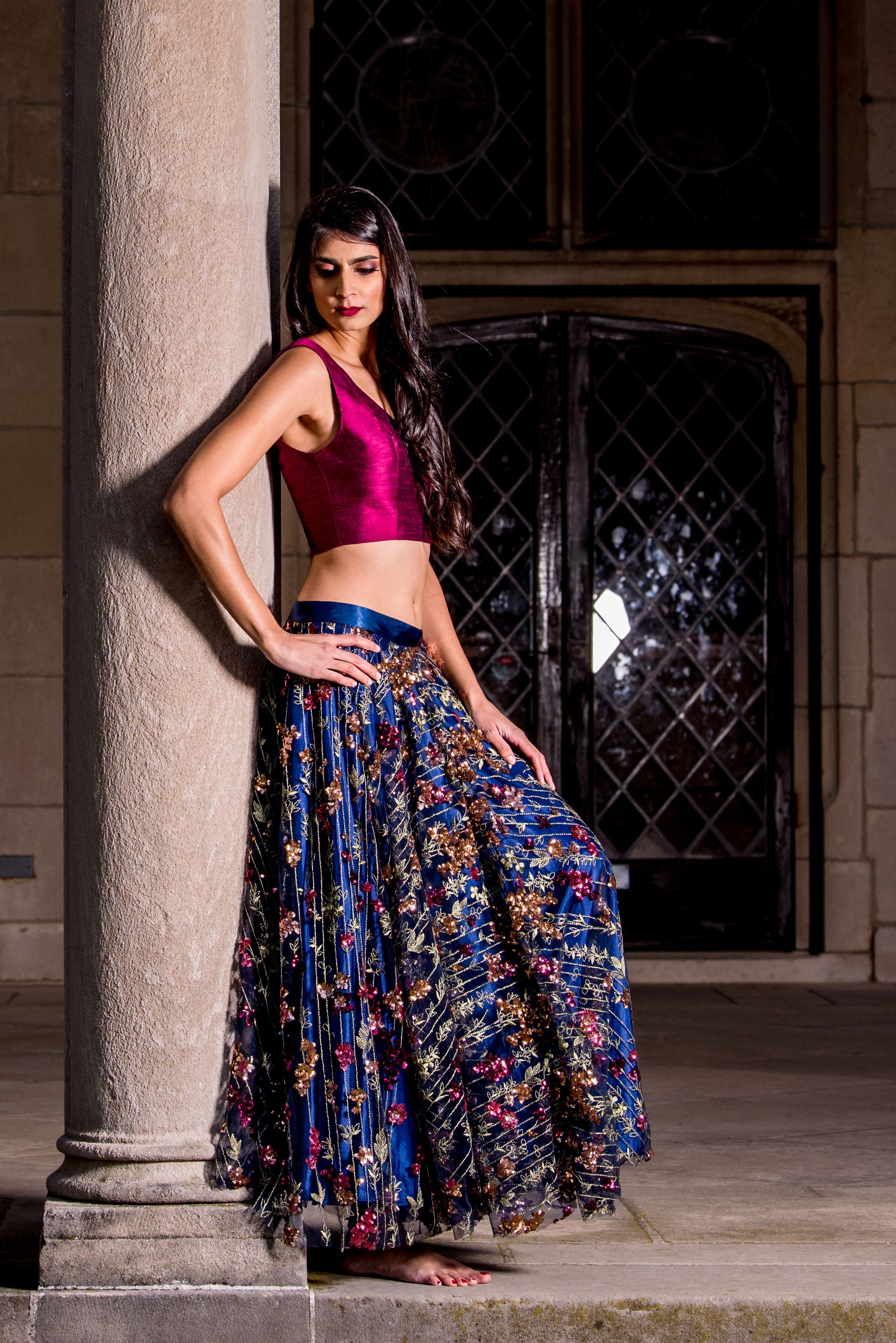 Wine lehenga with ruffled blouse and cape by Pallavi Poddar